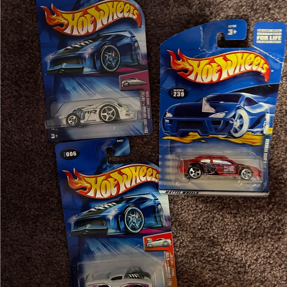 Lot of 3 Diecast Hot Wheels Cars!    New in packages!